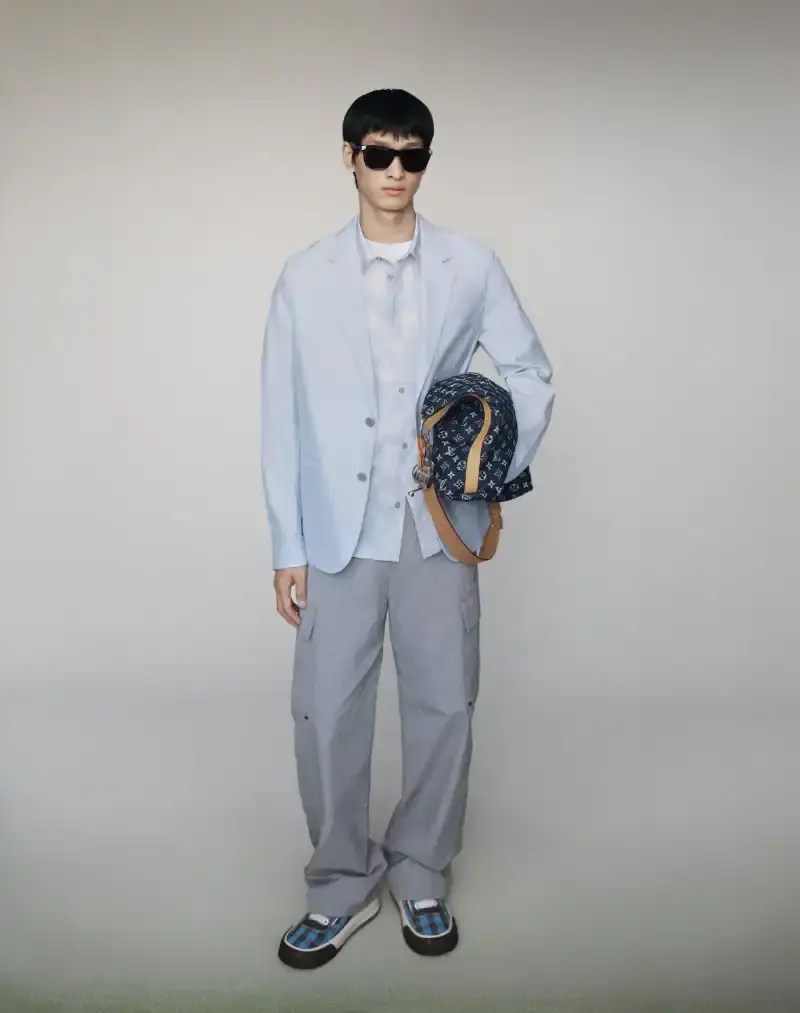PHARRELL WILLIAMS UNVEILS LV SPRING MENSWEAR CAPSULE image about Pharrell Williams' new spring menswear capsule collection for Louis Vuitton featuring seasonal colors, tailoring details, and house motifs. (image 10 of 24)