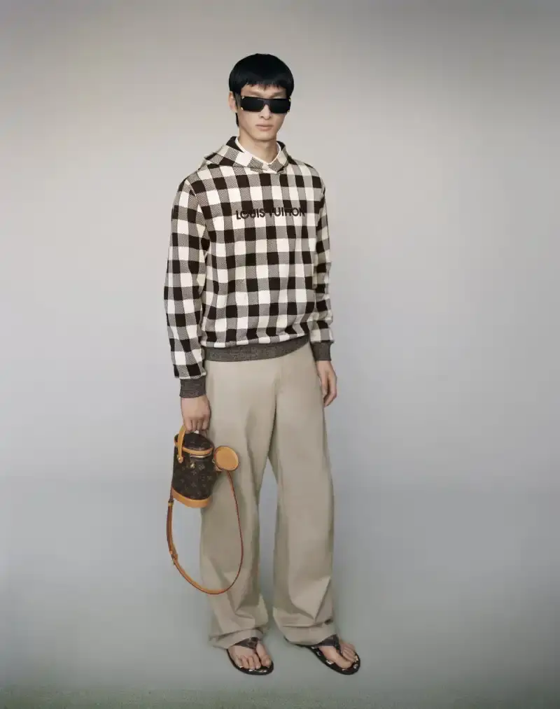PHARRELL WILLIAMS UNVEILS LV SPRING MENSWEAR CAPSULE image about Pharrell Williams' new spring menswear capsule collection for Louis Vuitton featuring seasonal colors, tailoring details, and house motifs. (image 12 of 24)