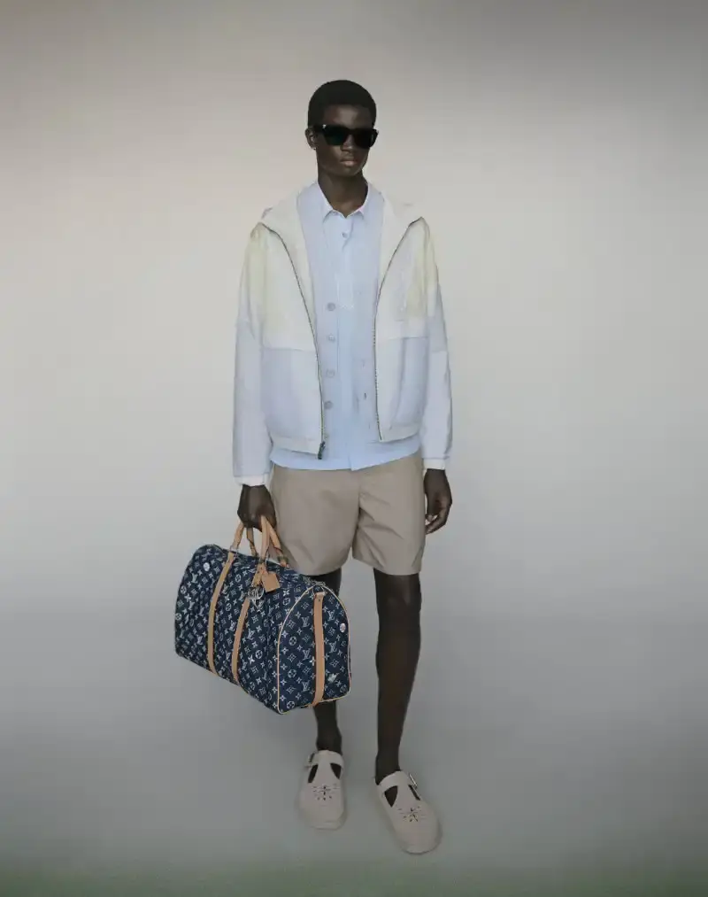 PHARRELL WILLIAMS UNVEILS LV SPRING MENSWEAR CAPSULE image about Pharrell Williams' new spring menswear capsule collection for Louis Vuitton featuring seasonal colors, tailoring details, and house motifs. (image 15 of 24)