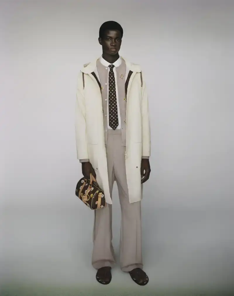 PHARRELL WILLIAMS UNVEILS LV SPRING MENSWEAR CAPSULE image about Pharrell Williams' new spring menswear capsule collection for Louis Vuitton featuring seasonal colors, tailoring details, and house motifs. (image 4 of 24)