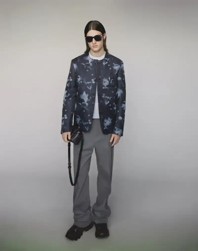 PHARRELL WILLIAMS UNVEILS LV SPRING MENSWEAR CAPSULE image about Pharrell Williams' new spring menswear capsule collection for Louis Vuitton featuring seasonal colors, tailoring details, and house motifs. (image 24 of 24)