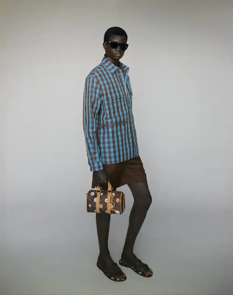 PHARRELL WILLIAMS UNVEILS LV SPRING MENSWEAR CAPSULE image about Pharrell Williams' new spring menswear capsule collection for Louis Vuitton featuring seasonal colors, tailoring details, and house motifs. (image 22 of 24)