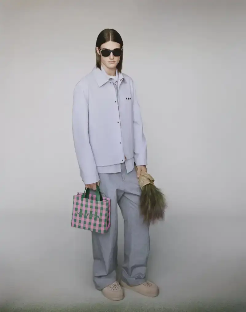 PHARRELL WILLIAMS UNVEILS LV SPRING MENSWEAR CAPSULE image about Pharrell Williams' new spring menswear capsule collection for Louis Vuitton featuring seasonal colors, tailoring details, and house motifs. (image 13 of 24)