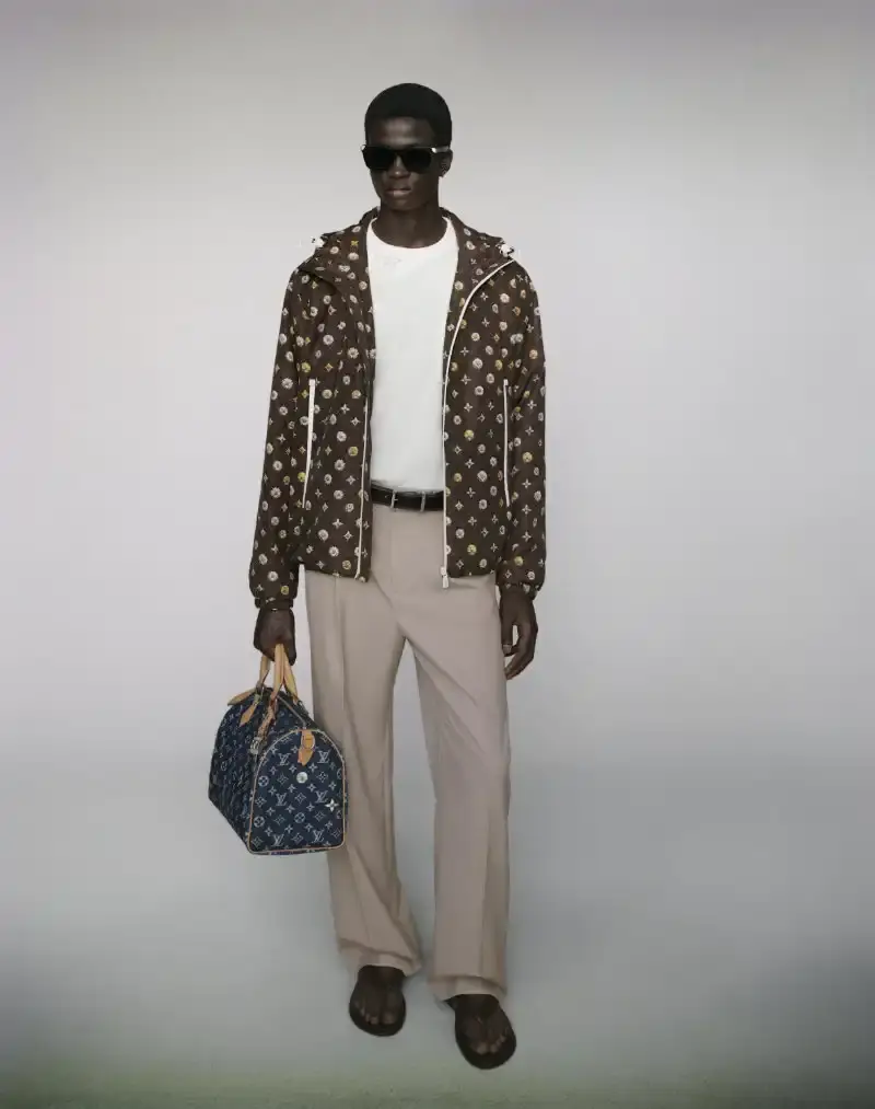 PHARRELL WILLIAMS UNVEILS LV SPRING MENSWEAR CAPSULE image about Pharrell Williams' new spring menswear capsule collection for Louis Vuitton featuring seasonal colors, tailoring details, and house motifs. (image 3 of 24)