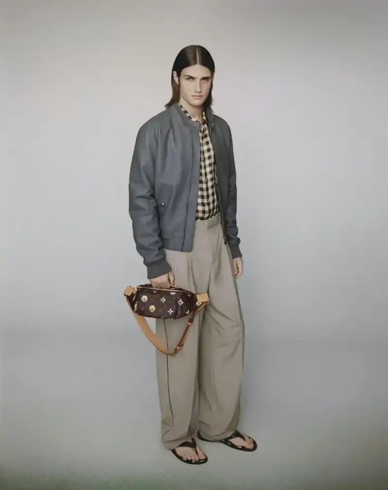PHARRELL WILLIAMS UNVEILS LV SPRING MENSWEAR CAPSULE image about Pharrell Williams' new spring menswear capsule collection for Louis Vuitton featuring seasonal colors, tailoring details, and house motifs. (image 17 of 24)