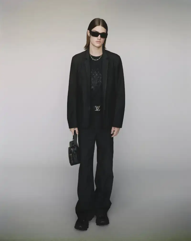 PHARRELL WILLIAMS UNVEILS LV SPRING MENSWEAR CAPSULE image about Pharrell Williams' new spring menswear capsule collection for Louis Vuitton featuring seasonal colors, tailoring details, and house motifs. (image 2 of 24)