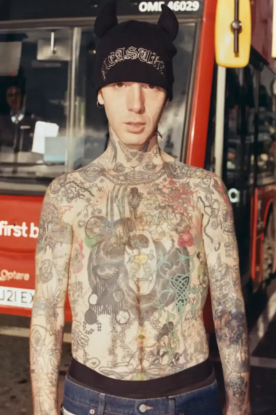 PLEASURES STRANGE WAYS EVERYDAY SPRING 2026 An article detailing the PLEASURES Spring 2026 clothing collection featuring workwear, denim, and graphic shirts shot by Jason Landis in London.