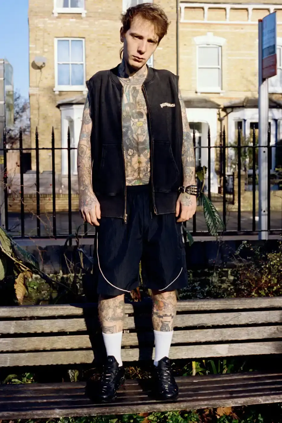 PLEASURES STRANGE WAYS EVERYDAY SPRING 2026 An article detailing the PLEASURES Spring 2026 clothing collection featuring workwear, denim, and graphic shirts shot by Jason Landis in London. (image 4 of 40)