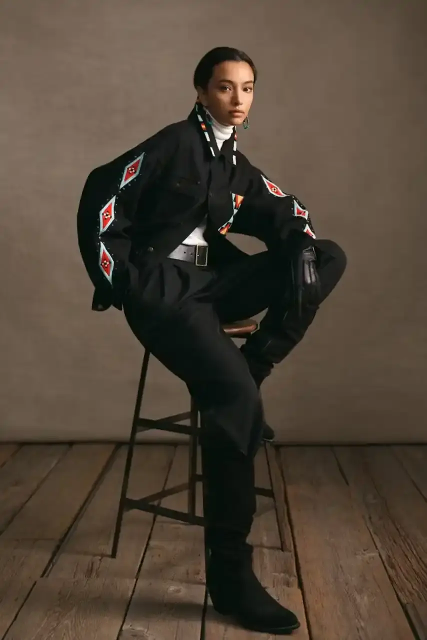 POLO RALPH LAUREN PARTNERS WITH TÓPA Polo Ralph Lauren and TÓPA, an Indigenous-led fashion label, release a collection combining traditional Northern Plains designs with modern apparel. The partnership supports Indigenous language preservation through Thunder Valley CDC. (image 9 of 14)