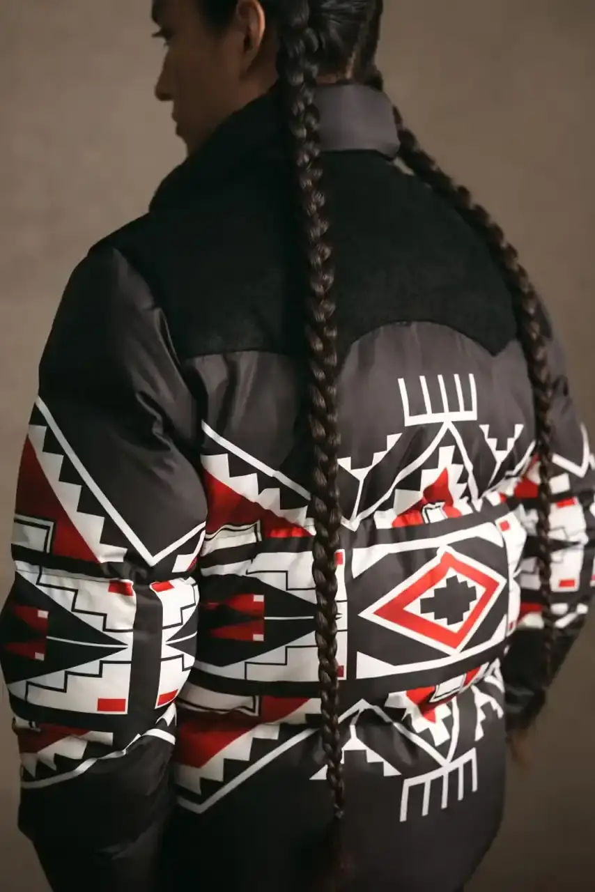 POLO RALPH LAUREN PARTNERS WITH TÓPA Polo Ralph Lauren and TÓPA, an Indigenous-led fashion label, release a collection combining traditional Northern Plains designs with modern apparel. The partnership supports Indigenous language preservation through Thunder Valley CDC. (image 8 of 14)