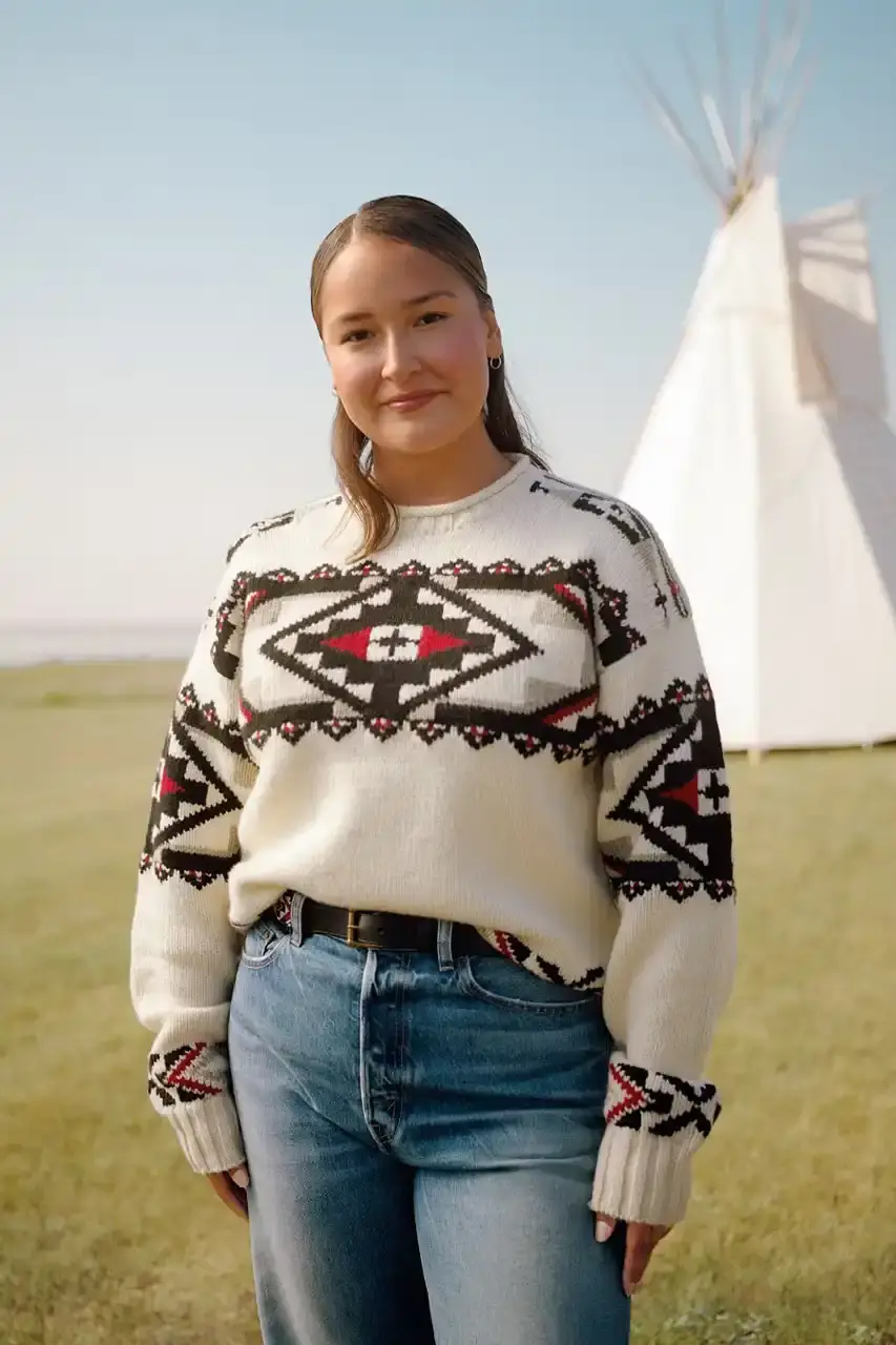POLO RALPH LAUREN PARTNERS WITH TÓPA Polo Ralph Lauren and TÓPA, an Indigenous-led fashion label, release a collection combining traditional Northern Plains designs with modern apparel. The partnership supports Indigenous language preservation through Thunder Valley CDC. (image 14 of 14)