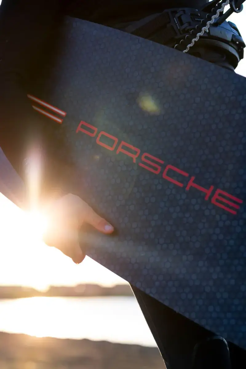 PORSCHE DUOTONE KITEBOARDING CAYENNE DROP image of the sports collaboration between Porsche and Duotone featuring kiteboarding gear inspired by the Cayenne Turbo Electric. (image 3 of 8)