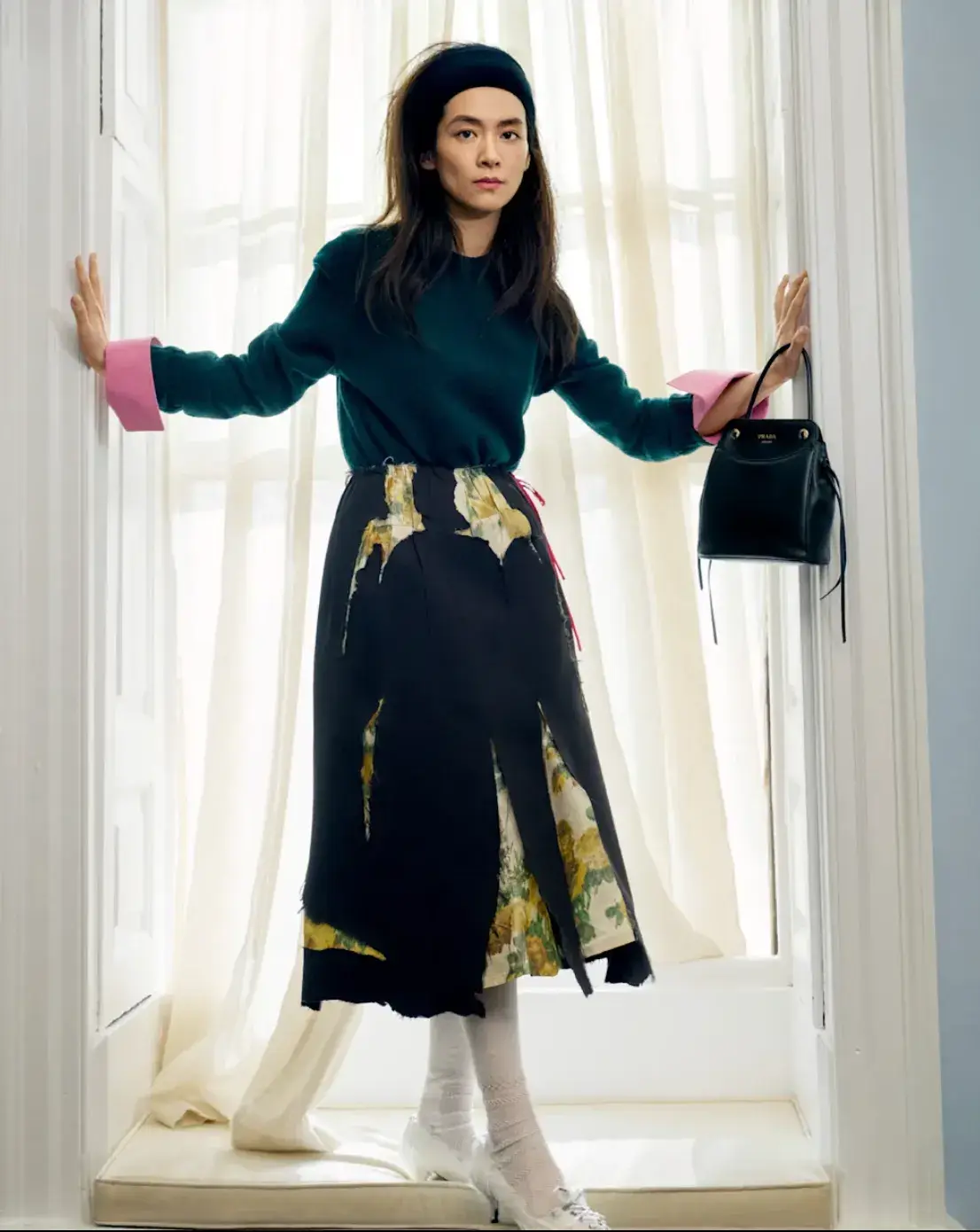 PRADA CARRY BAG FALL WINTER 2026 image of the Prada Carry bag from the Fall Winter 2026 collection. The accessory features soft calfskin leather and front pockets. (image 2 of 2)