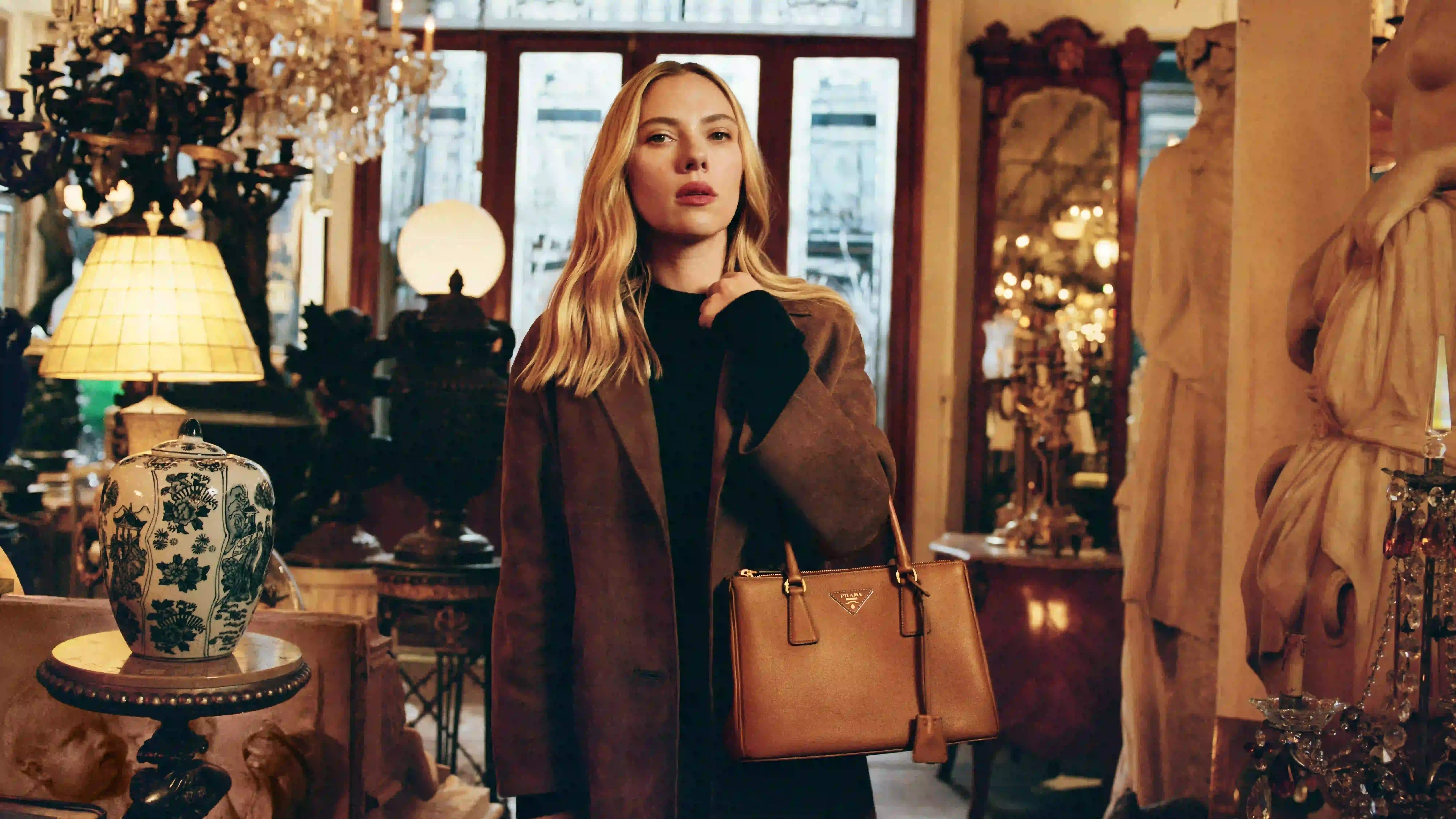 PRADA DIRECTED BY YORGOS LANTHIMOS image of Prada’s 2025 Galleria campaign directed by Yorgos Lanthimos, featuring Scarlett Johansson and exploring identity through cinematic imagery. (image 4 of 4)