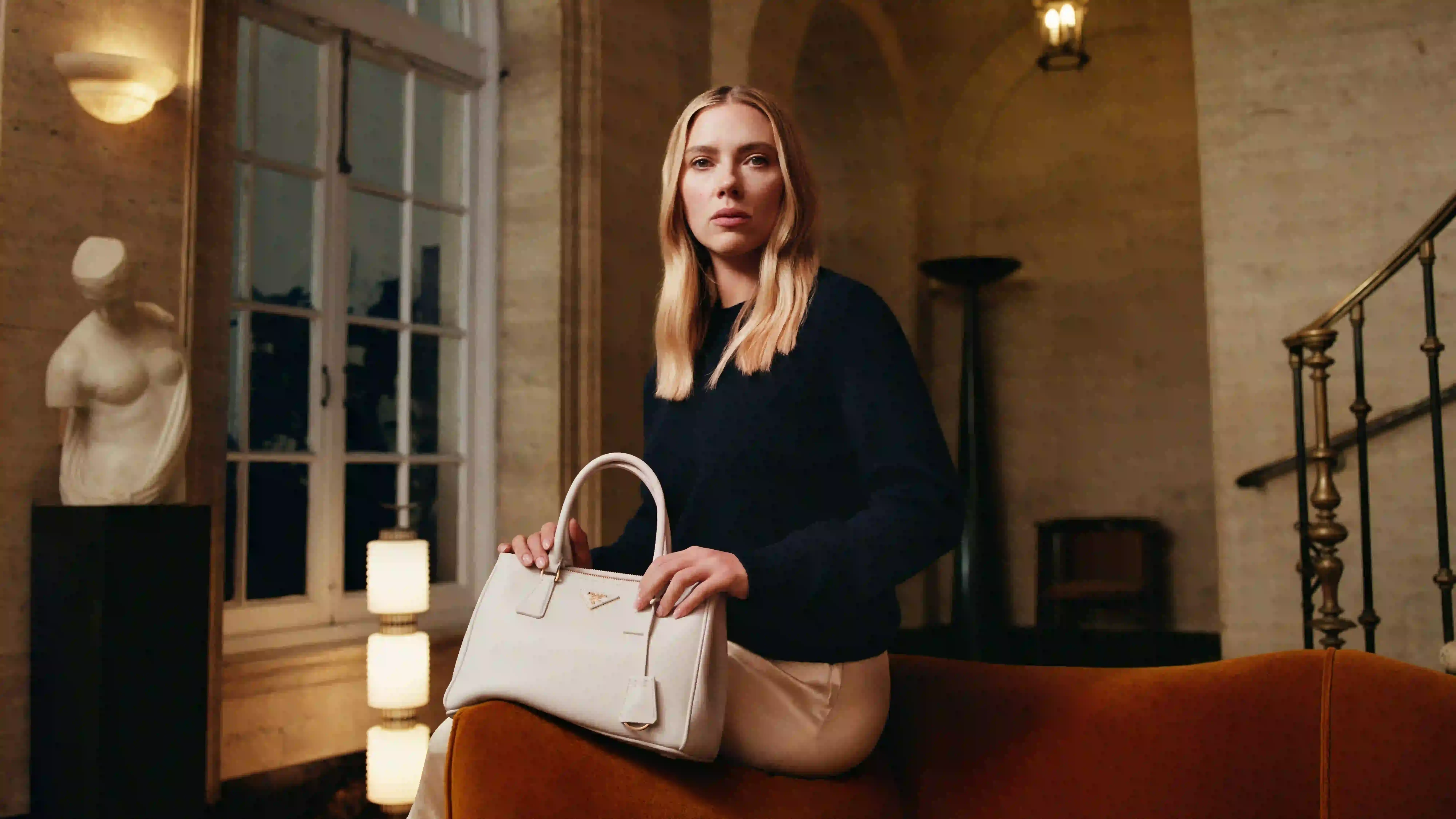 PRADA DIRECTED BY YORGOS LANTHIMOS image of Prada’s 2025 Galleria campaign directed by Yorgos Lanthimos, featuring Scarlett Johansson and exploring identity through cinematic imagery. (image 3 of 4)