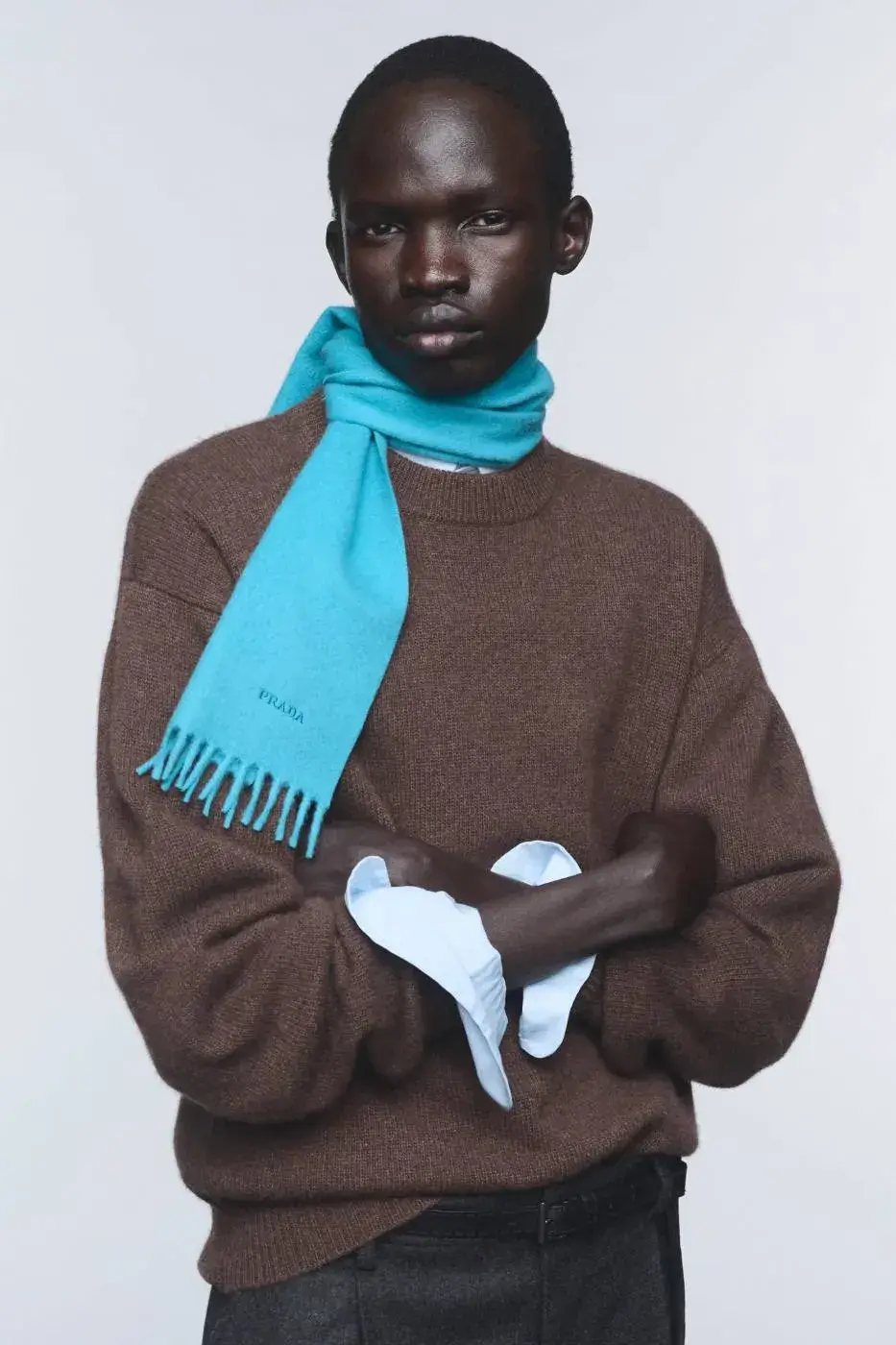 PRADA RE-CASHMERE AND RE-WOOL ENTER READY-TO-WEAR image of Prada's new Re-Cashmere and Re-Wool lines, made from recovered fibres in Tuscany and Umbria. Covers fibre composition, certifications, product types and availability.
