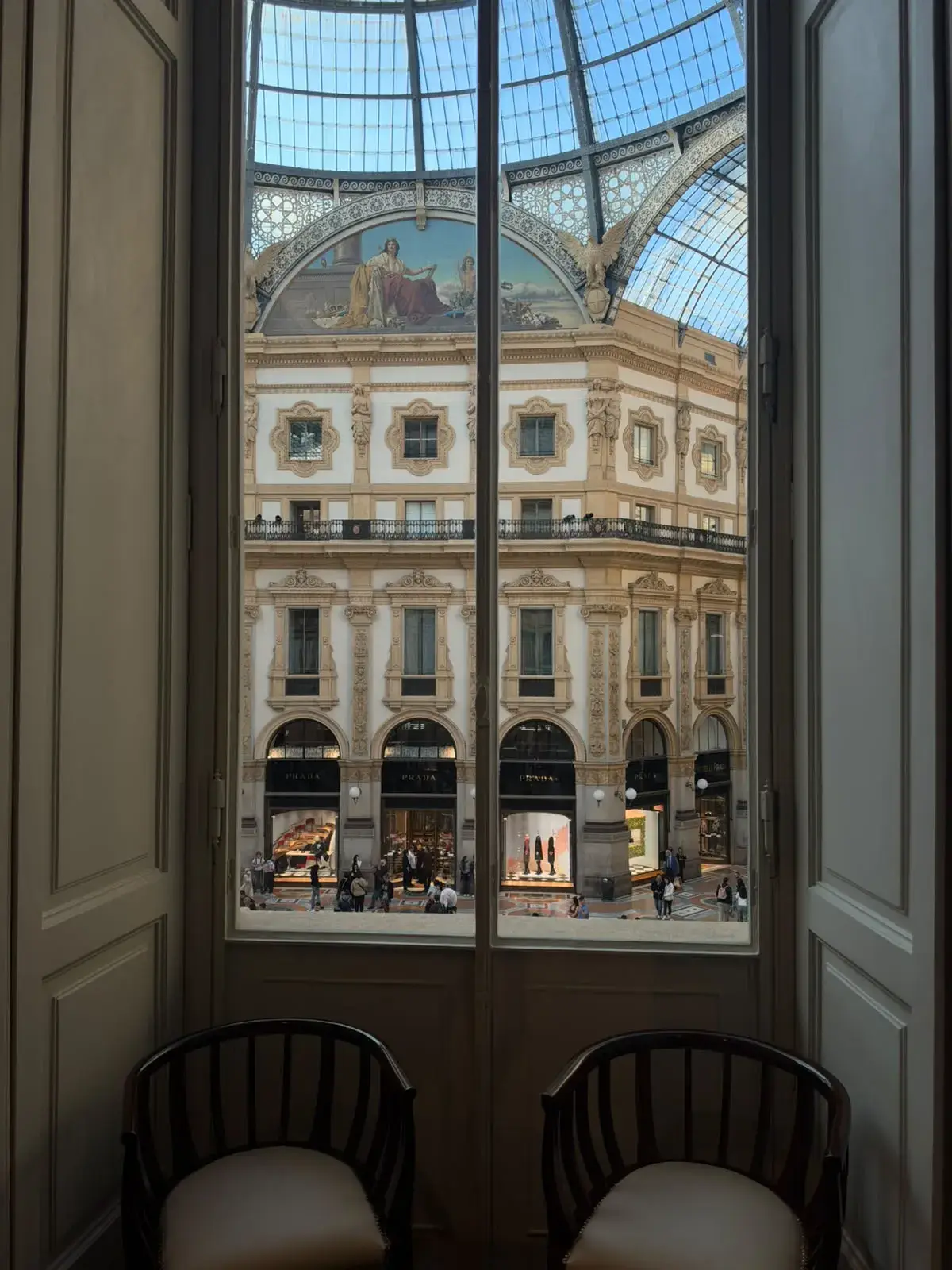 Exhibition view of Pradasphere inside Galleria Vittorio Emanuele II in Milan showing archival Prada designs and garments. (image 2 of 6)