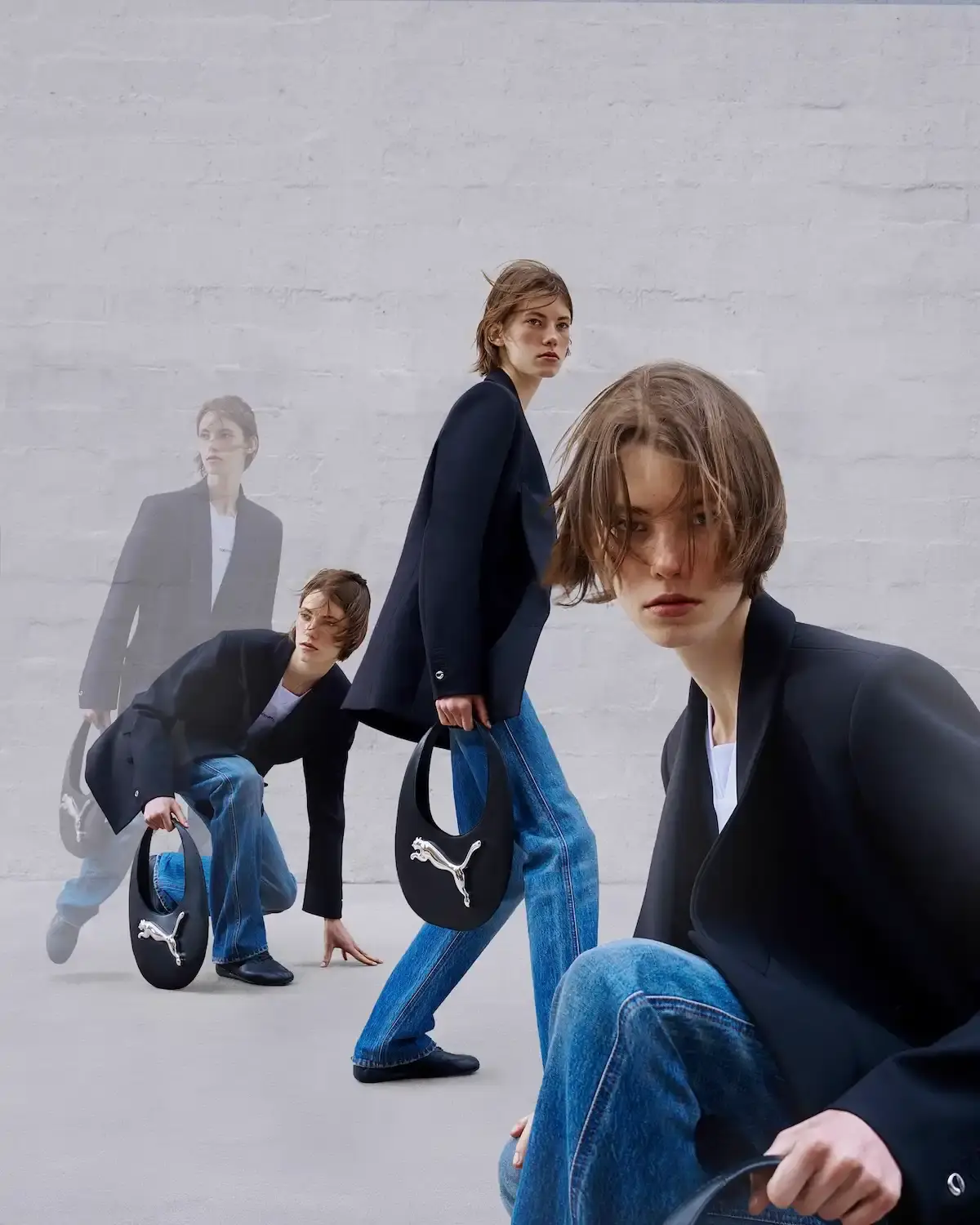 Puma/Coperni The image shows the PUMA and Coperni collaborative collection. It includes an asymmetrical gown and top made from sustainable technical fabric, a hoodie with cat ears, co-branded t-shirts, and reinterpreted versions of the Swipe Bag and Speedcat and 90SQR sneakers. The collection is designed to merge fashion, sportswear, and technology.
