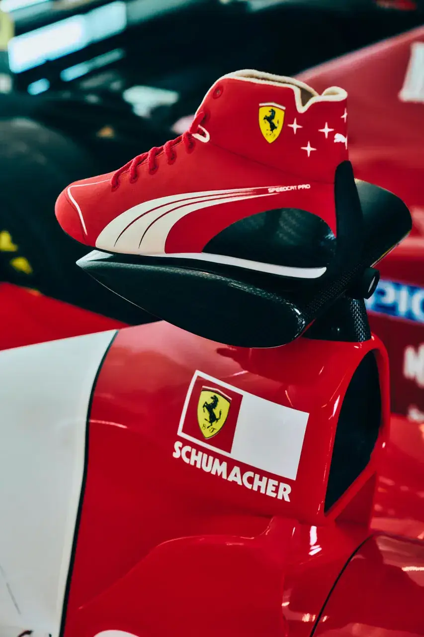 PUMA AND FERRARI HONOR MICHAEL SCHUMACHER an image detailing the new PUMA and Scuderia Ferrari Monza 2026 apparel collection honoring Michael Schumacher. (image 5 of 8)