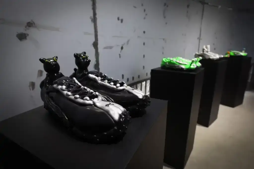 PUMA'S H-STREET SNEAKERS LAUNCH CELEBRATED WITH SEOUL EXHIBITION image of PUMA's H-Street sneakers launch event in Seoul, describing the exhibition venue's athletics-inspired design, notable attendees including K-pop celebrity Rosé, and quotes from PUMA's Global Marketing Director. The piece explains that the exhibition is part of PUMA's Future Archives initiative honoring classic designs and mentions that it remains open to the public through May 18 with various interactive elements including styling areas, music spaces, archival displays, and group activities. (image 3 of 8)