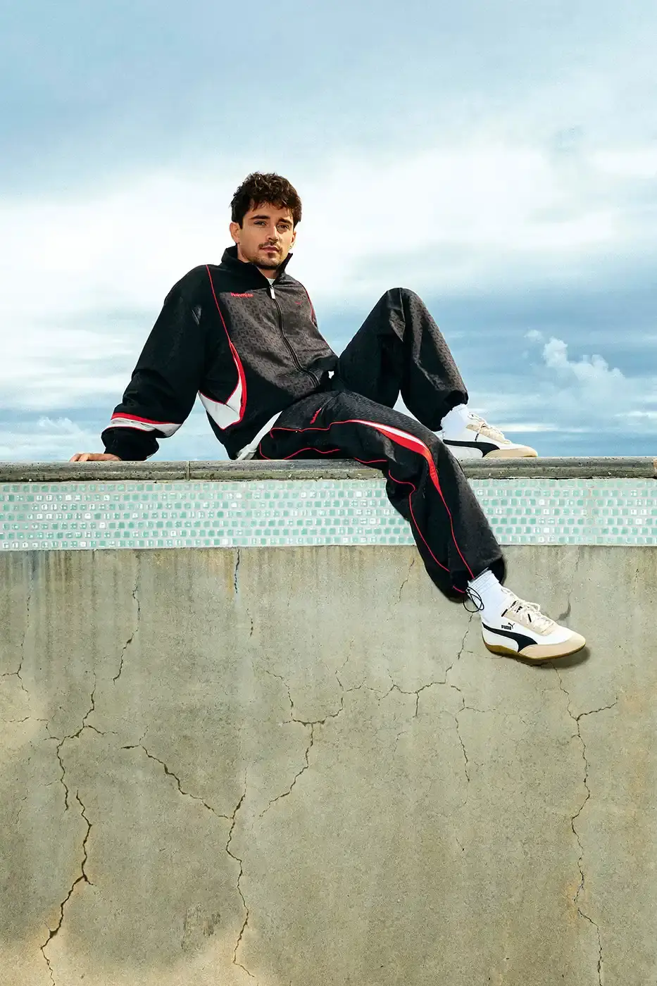 PUMA AND NAHMIAS RELEASE WEST COAST INSPIRED SPEEDCAT SNEAKERS An image detailing the new apparel and footwear collection from PUMA and NAHMIAS featuring Formula 1 driver Charles Leclerc. (image 4 of 10)