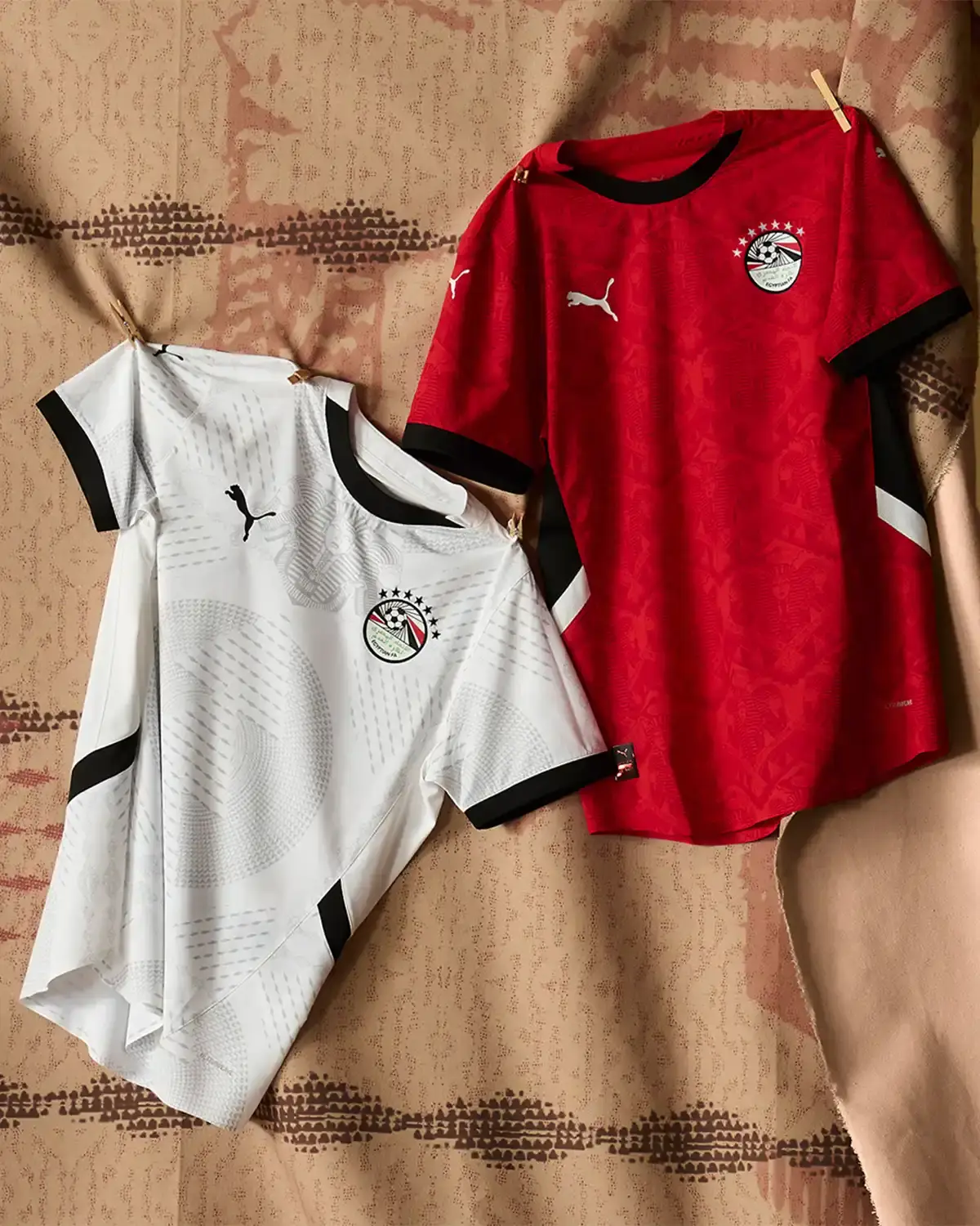 Puma Full lineup of PUMA's AFCON 2025 kit collection showing all ten uniforms for Morocco, Egypt, Ivory Coast, Senegal, and Ghana national teams, displayed on mannequins