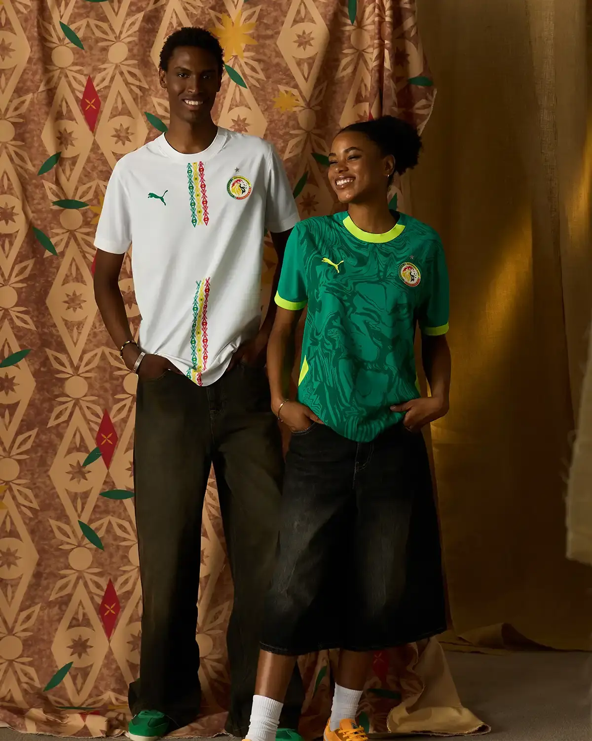 Puma Morocco Home Kit: "Morocco's red home jersey with intricate zellige tile patterns woven into the fabric, featuring the national crest and PUMA logo