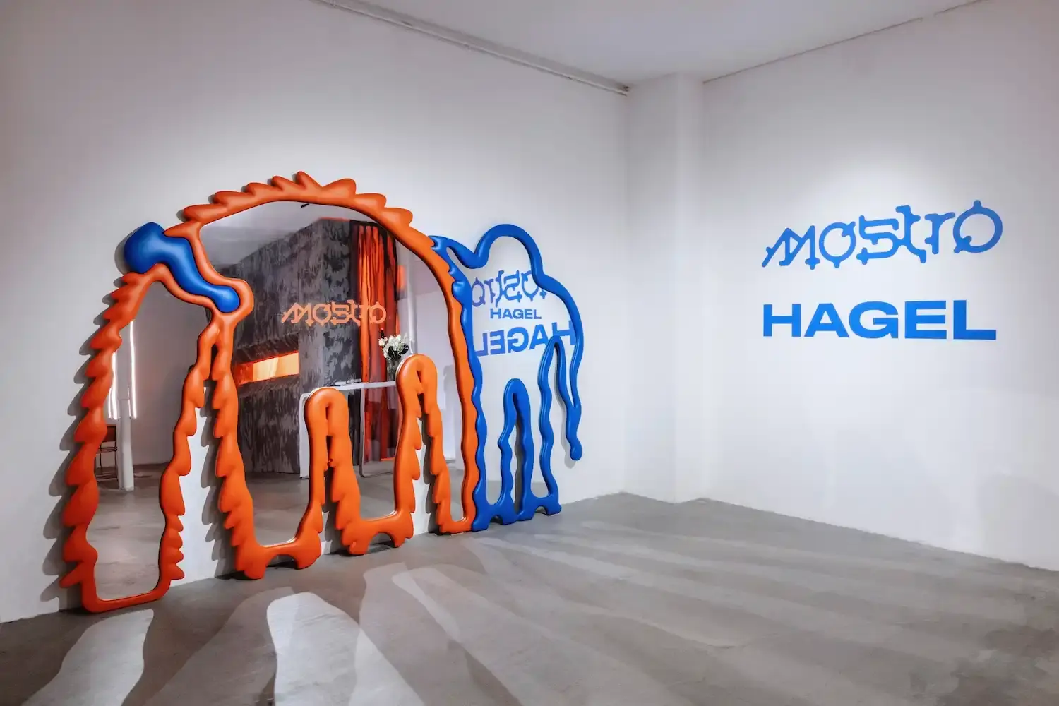 Puma Image shows PUMA's Paris Fashion Week event promotional visual, highlighting collaborative design, urban culture, and the Mostro sneaker with diverse creative elements in the background. (image 5 of 6)