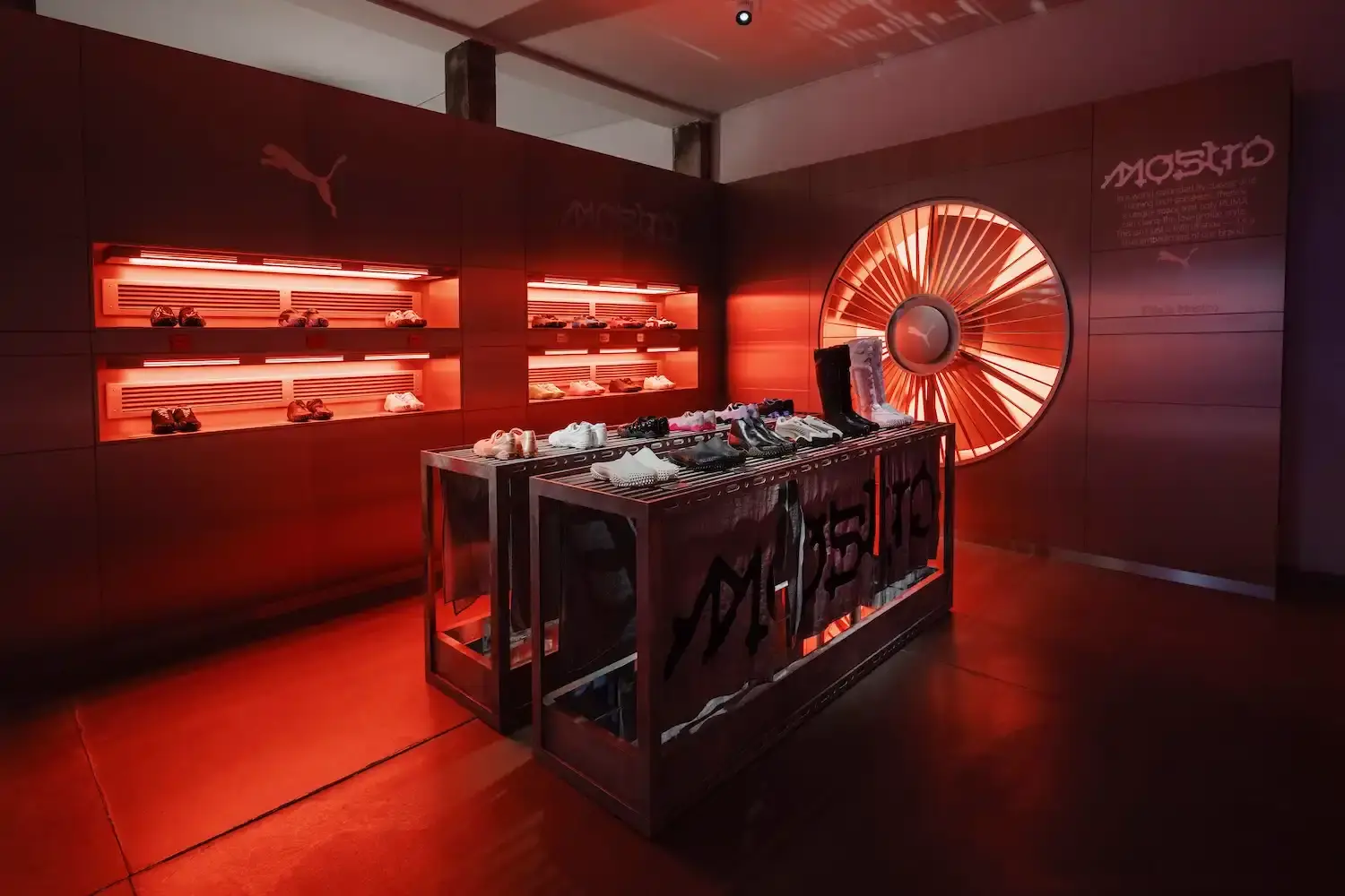 Puma Image shows PUMA's Paris Fashion Week event promotional visual, highlighting collaborative design, urban culture, and the Mostro sneaker with diverse creative elements in the background. (image 3 of 6)