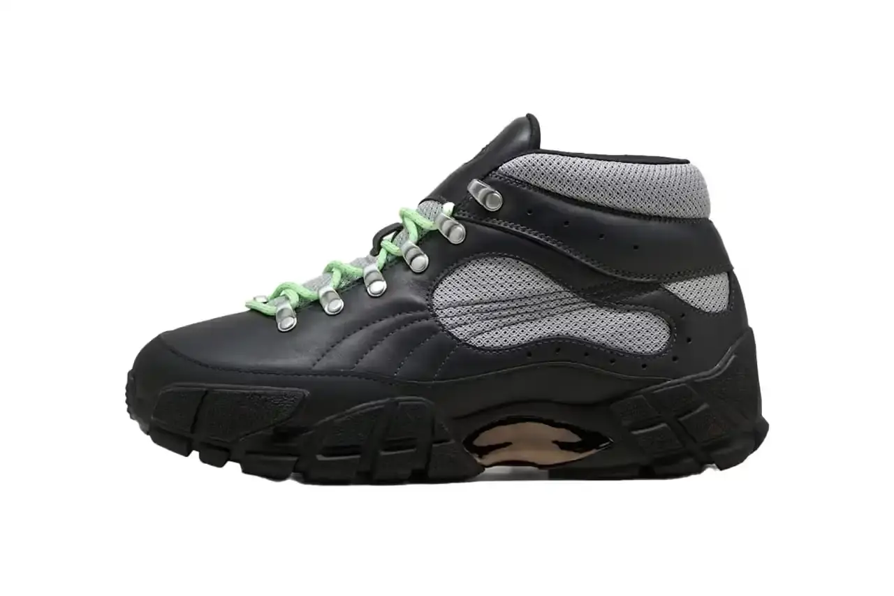 Puma PUMA x Skepta Skope Forever Mid sneaker in Flat Dark Gray/PUMA Silver/PUMA Black colorway, featuring black leather uppers, gray mesh panels, chrome accents, and bright turquoise laces. The shoe has a distinctive Y2K-inspired silhouette with utilitarian details. (image 6 of 10)