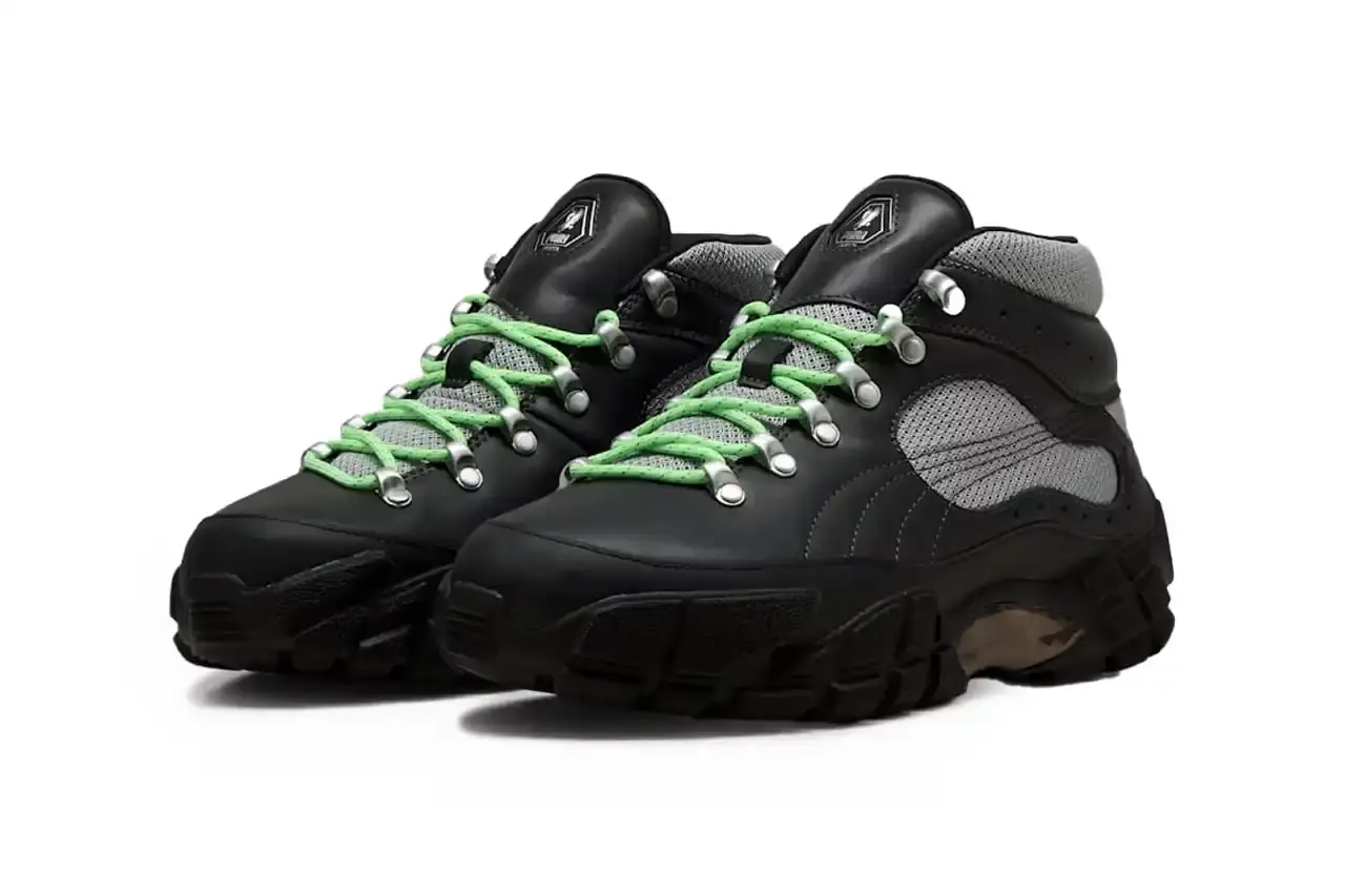 Puma PUMA x Skepta Skope Forever Mid sneaker in Flat Dark Gray/PUMA Silver/PUMA Black colorway, featuring black leather uppers, gray mesh panels, chrome accents, and bright turquoise laces. The shoe has a distinctive Y2K-inspired silhouette with utilitarian details. (image 7 of 10)
