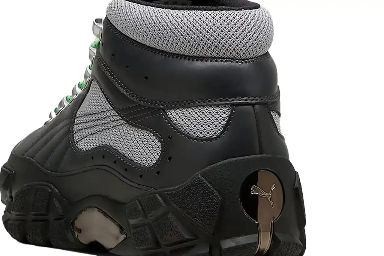 Puma PUMA x Skepta Skope Forever Mid sneaker in Flat Dark Gray/PUMA Silver/PUMA Black colorway, featuring black leather uppers, gray mesh panels, chrome accents, and bright turquoise laces. The shoe has a distinctive Y2K-inspired silhouette with utilitarian details. (image 10 of 10)