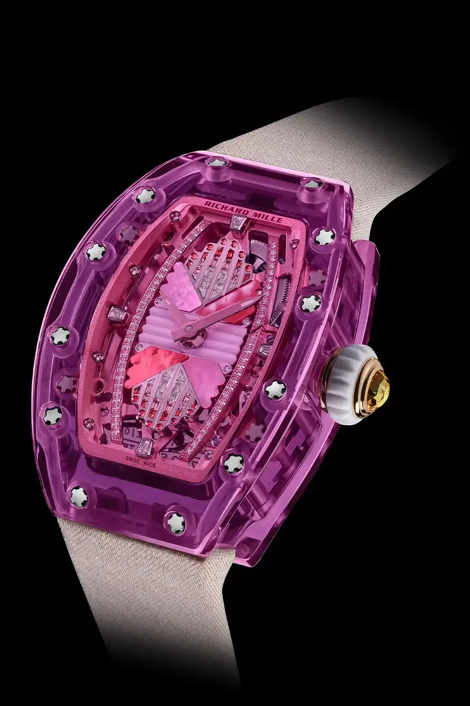 Richard Mille Richard Mille RM 07-02 luxury watch with a transparent colored sapphire crystal case. The watch features a geometric pattern dial set with precious stones including diamonds, sapphires, and ornamental stones. The skeletonized automatic movement is visible through the translucent case, showing intricate mechanical details and gold components. (image 19 of 22)