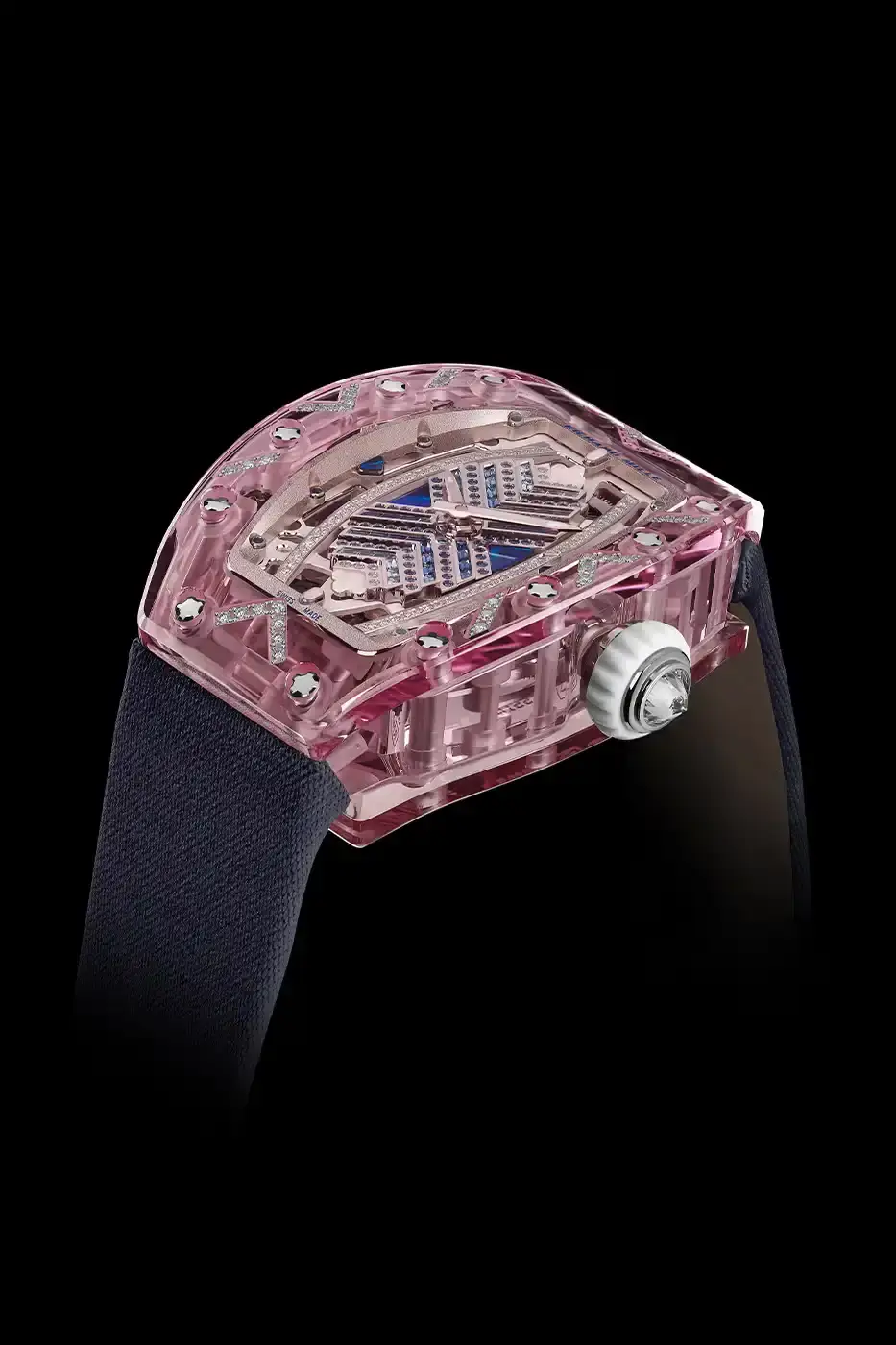 Richard Mille Richard Mille RM 07-02 luxury watch with a transparent colored sapphire crystal case. The watch features a geometric pattern dial set with precious stones including diamonds, sapphires, and ornamental stones. The skeletonized automatic movement is visible through the translucent case, showing intricate mechanical details and gold components. (image 16 of 22)