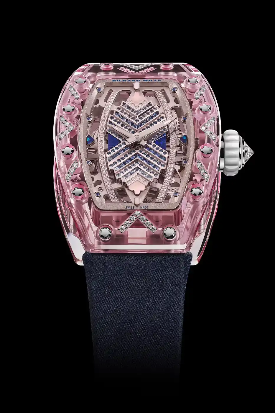 Richard Mille Richard Mille RM 07-02 luxury watch with a transparent colored sapphire crystal case. The watch features a geometric pattern dial set with precious stones including diamonds, sapphires, and ornamental stones. The skeletonized automatic movement is visible through the translucent case, showing intricate mechanical details and gold components. (image 17 of 22)