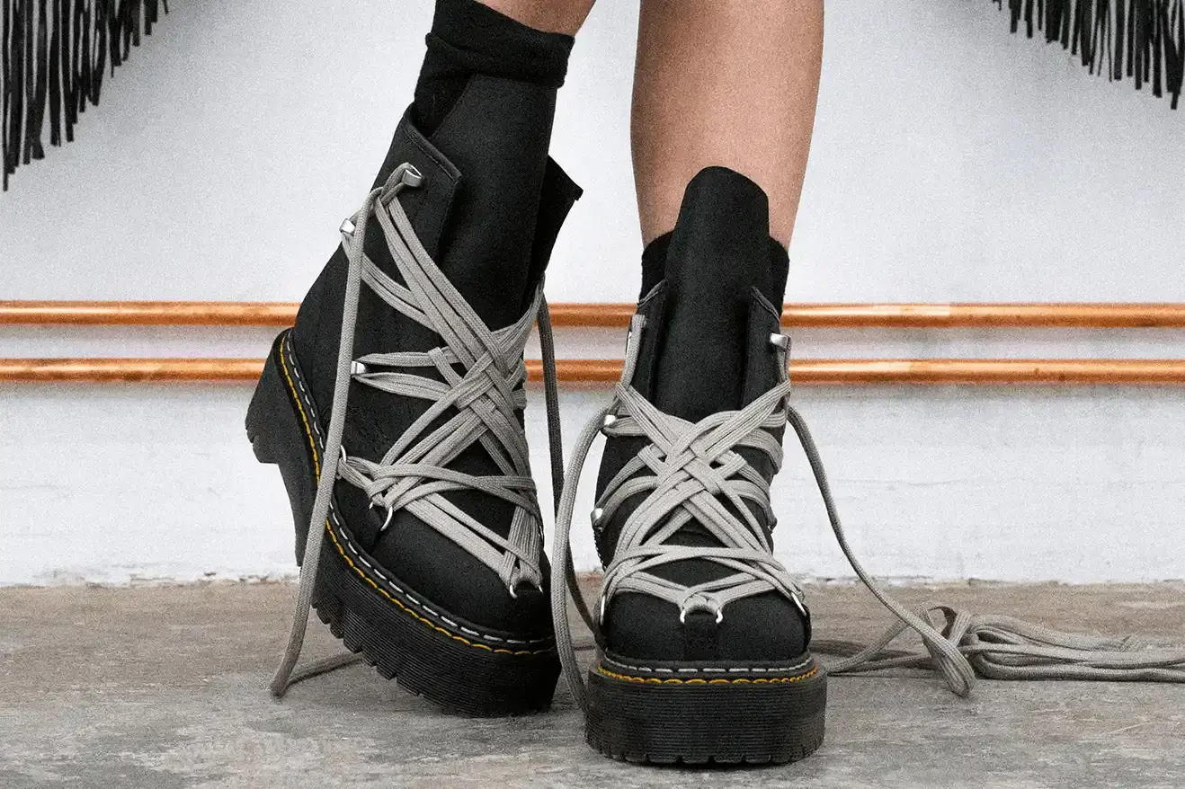 RICK OWENS AND DR. MARTENS RETURN WITH QUAD BOOT COLLECTION Fashion collaboration between Rick Owens and Dr. Martens produces three black leather boots with platform soles, releasing October 16, 2025. (image 4 of 10)