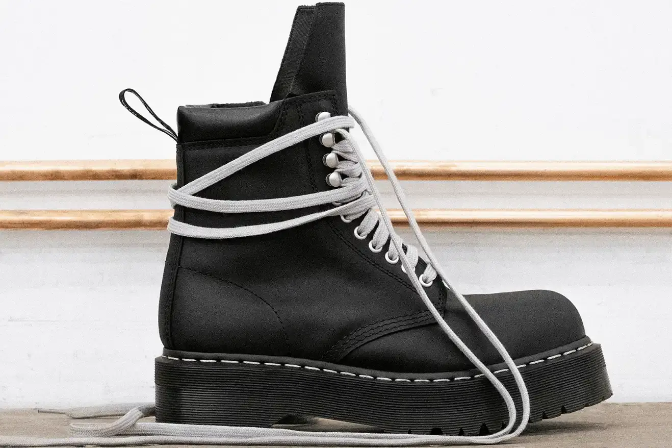 RICK OWENS AND DR. MARTENS RETURN WITH QUAD BOOT COLLECTION Fashion collaboration between Rick Owens and Dr. Martens produces three black leather boots with platform soles, releasing October 16, 2025. (image 6 of 10)