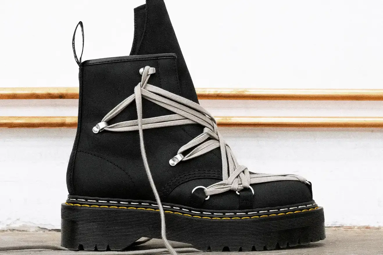 RICK OWENS AND DR. MARTENS RETURN WITH QUAD BOOT COLLECTION Fashion collaboration between Rick Owens and Dr. Martens produces three black leather boots with platform soles, releasing October 16, 2025. (image 3 of 10)