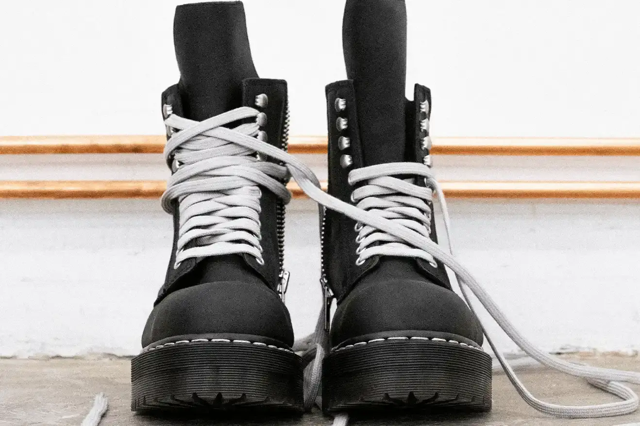 RICK OWENS AND DR. MARTENS RETURN WITH QUAD BOOT COLLECTION Fashion collaboration between Rick Owens and Dr. Martens produces three black leather boots with platform soles, releasing October 16, 2025. (image 5 of 10)