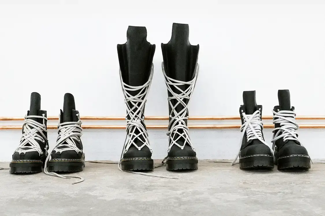 RICK OWENS AND DR. MARTENS RETURN WITH QUAD BOOT COLLECTION Fashion collaboration between Rick Owens and Dr. Martens produces three black leather boots with platform soles, releasing October 16, 2025.
