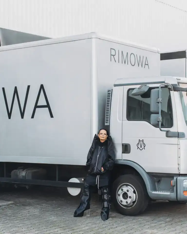 RIMOWA RIMOWA x Rick Owens bronze aluminum cabin suitcase with dark metallic finish and black leather details against neutral background (image 4 of 4)