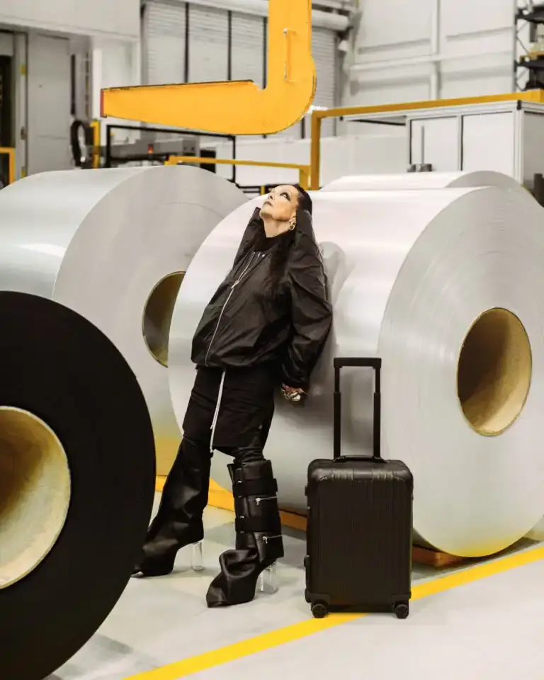 RIMOWA RIMOWA x Rick Owens bronze aluminum cabin suitcase with dark metallic finish and black leather details against neutral background (image 3 of 4)