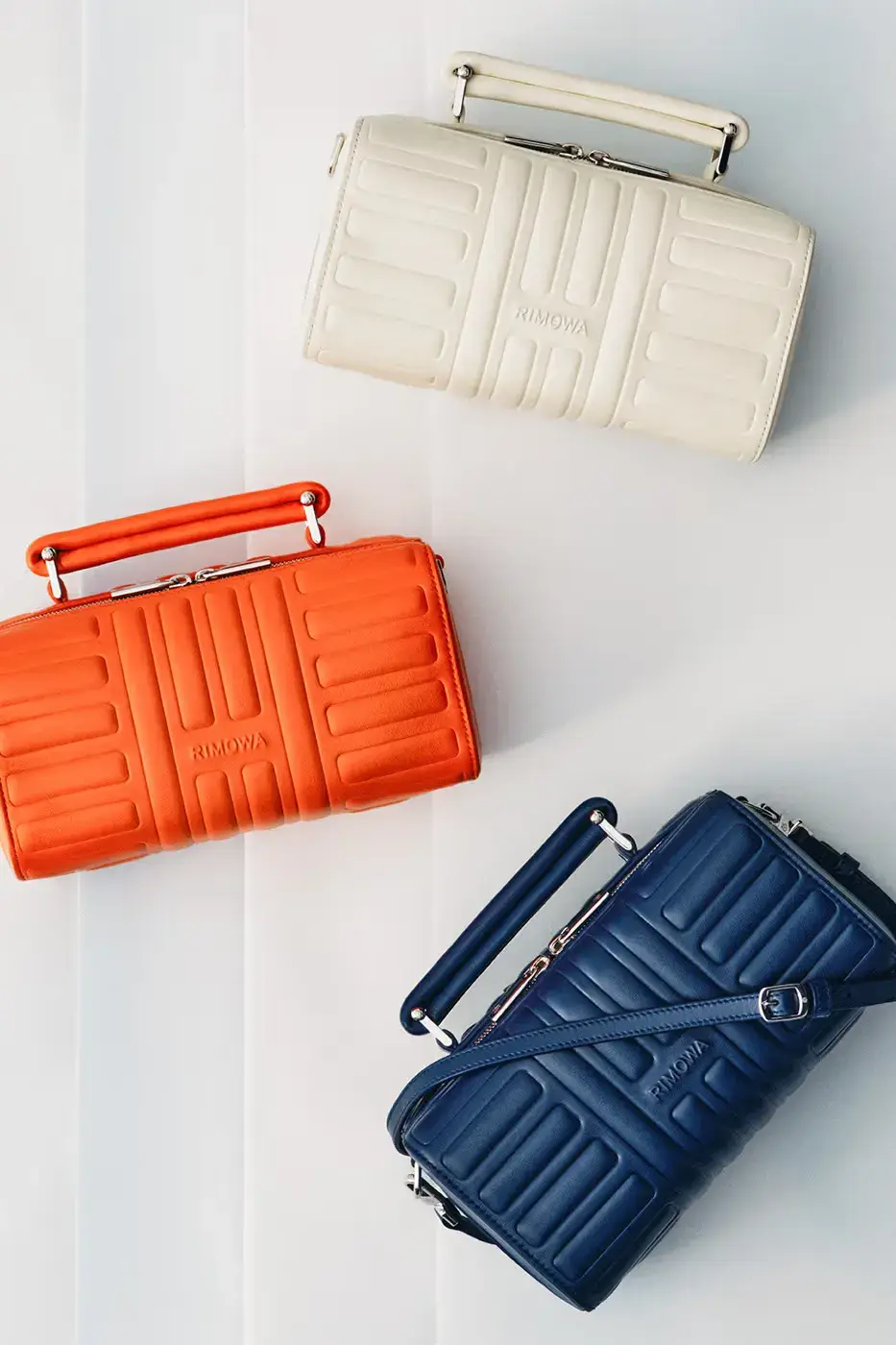 RIMOWA ORIGINAL LUGGAGE GAINS PERMANENT INK BLUE SHADE image announces the release of RIMOWA's permanent Ink Blue colorway for Original aluminium suitcases, detailing dimensions, pricing, and matching accessories. (image 4 of 9)