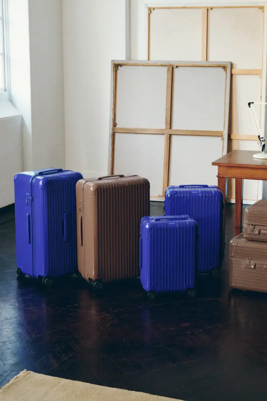 RIMOWA ADDS UMBER AND ULTRAMARINE TO ESSENTIAL AND GROOVE image about two new RIMOWA colors, Umber brown and Ultramarine blue, applied to Essential suitcases and Groove leather bags. Actor Joe Alwyn plays a young painter in the campaign. (image 9 of 10)
