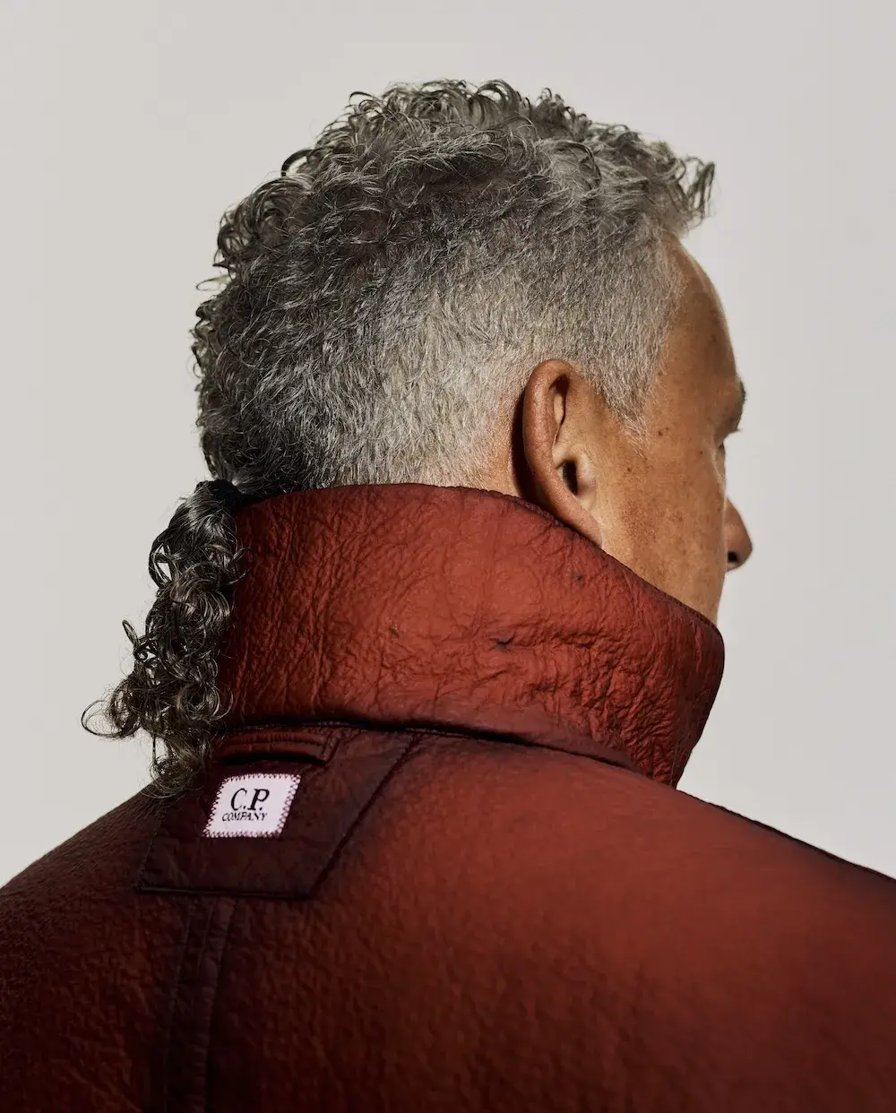ROBERTO BAGGIO FRONTS C.P. COMPANY FW26 CAMPAIGN image of Roberto Baggio modeling for the C.P. Company Fall Winter 2026 menswear collection. (image 4 of 4)