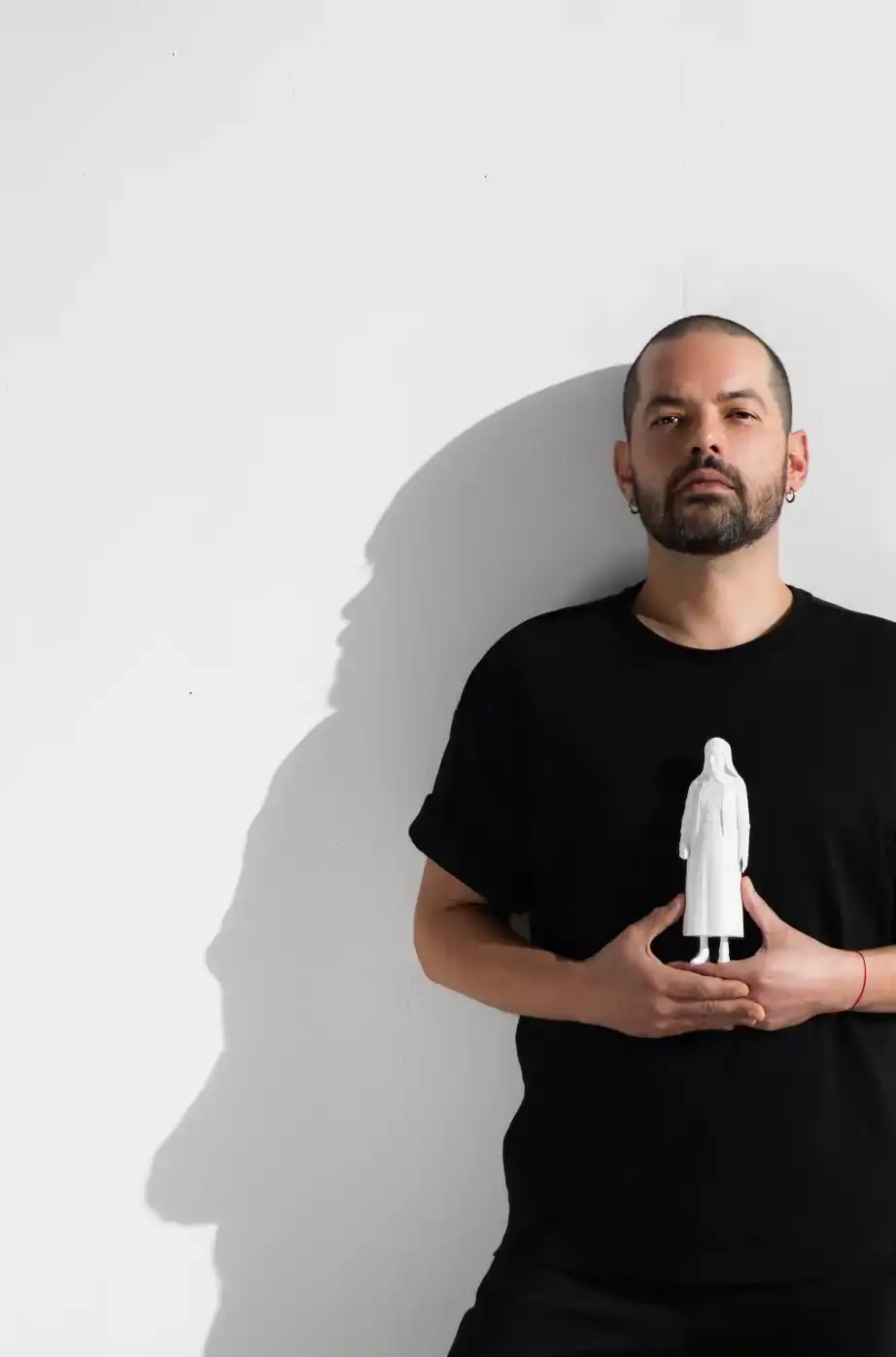 RODOLFO AGRELLA: DESIGNING FAITH THROUGH VISUAL CODES Interview about a designer Rodolfo Agrella shaping a modern visual identity for a Catholic saint, linking faith, culture, and design systems. (image 6 of 7)