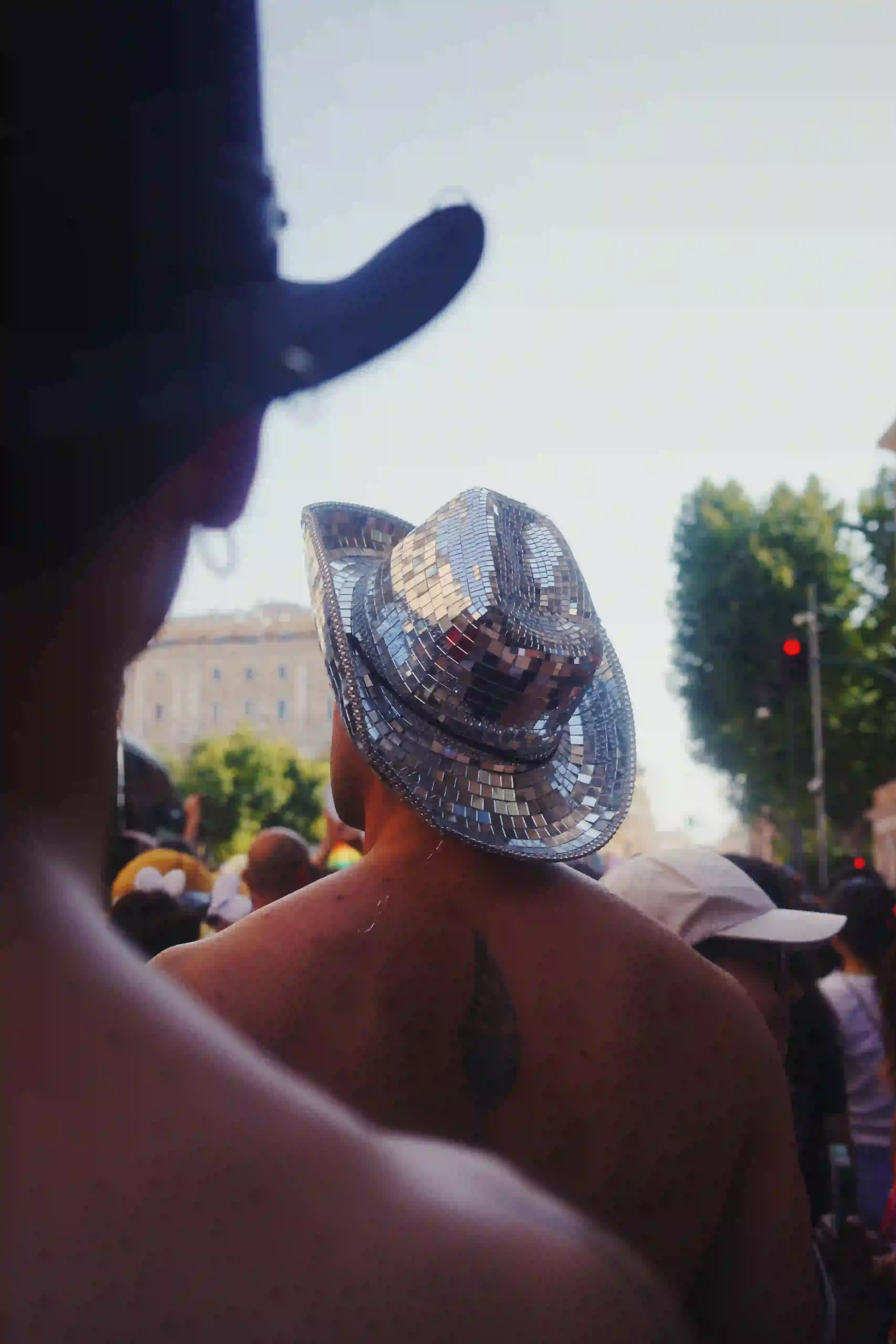 ROME PRIDE MARCH DRAWS 200,000 PARTICIPANTS image about Rome's 2025 Pride march, which drew approximately 200,000 participants. The event used the theme "Outlaws" to highlight legal challenges facing LGBTQ+ individuals in Italy, including lack of recognition for rainbow families and transgender rights. The article provides context about similar restrictions in other countries, particularly Hungary's recent ban on Pride events in Budapest. The piece includes quotes from event organizers explaining the significance of the theme choice and describes the march's logistics and scale within Southern Europe. photography by Ada Johnsson (image 6 of 13)