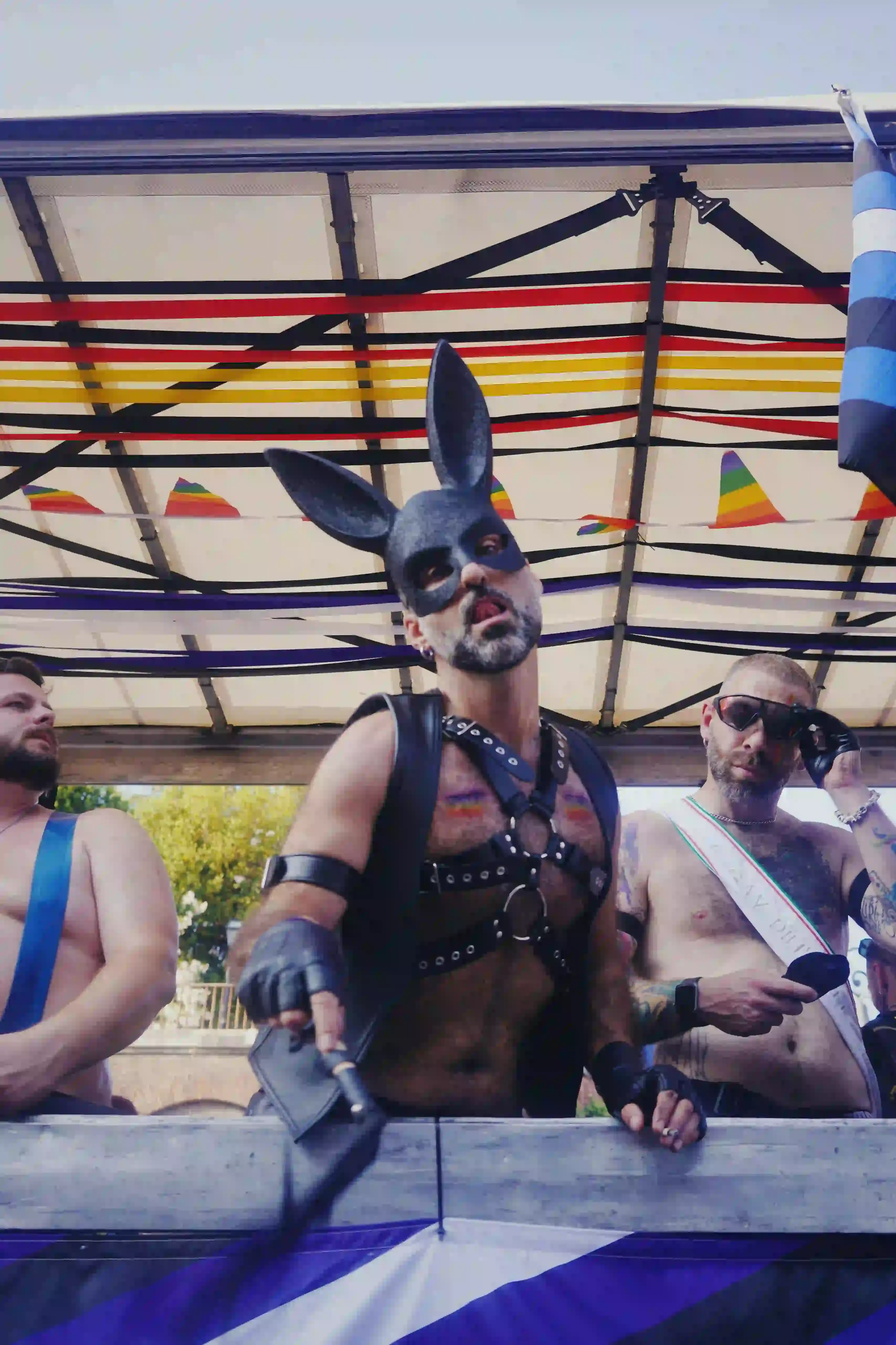 ROME PRIDE MARCH DRAWS 200,000 PARTICIPANTS image about Rome's 2025 Pride march, which drew approximately 200,000 participants. The event used the theme "Outlaws" to highlight legal challenges facing LGBTQ+ individuals in Italy, including lack of recognition for rainbow families and transgender rights. The article provides context about similar restrictions in other countries, particularly Hungary's recent ban on Pride events in Budapest. The piece includes quotes from event organizers explaining the significance of the theme choice and describes the march's logistics and scale within Southern Europe. photography by Ada Johnsson (image 3 of 13)