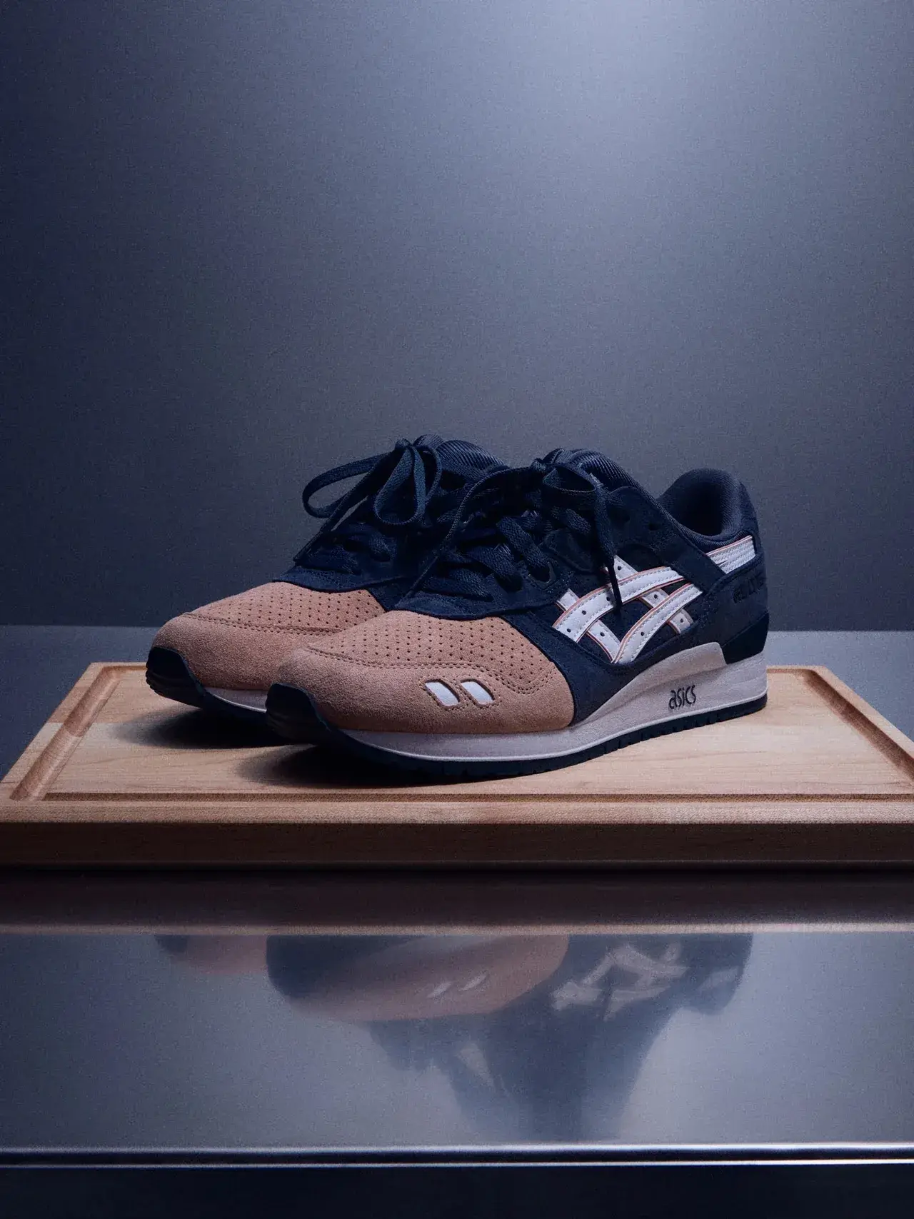 KITH RERELEASES RONNIE FIEG ASICS GEL-LYTE III SALMON TOE Image detailing the return of the 2011 Ronnie Fieg x ASICS GEL-LYTE III Salmon Toe sneaker for Kith's 15th anniversary, including release dates, packaging details, and design updates. (image 2 of 3)