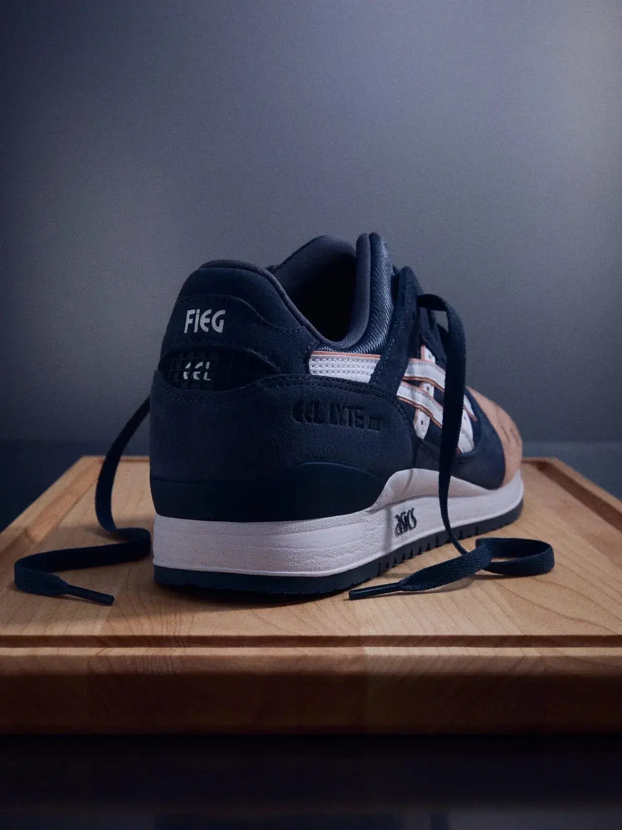 KITH RERELEASES RONNIE FIEG ASICS GEL-LYTE III SALMON TOE Image detailing the return of the 2011 Ronnie Fieg x ASICS GEL-LYTE III Salmon Toe sneaker for Kith's 15th anniversary, including release dates, packaging details, and design updates. (image 3 of 3)